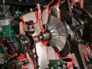 Opengewerkte motor met tandwielen, assen en een grote rotor
